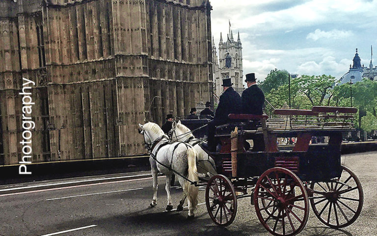 Photography page badge - image of horse drawn carriage in London